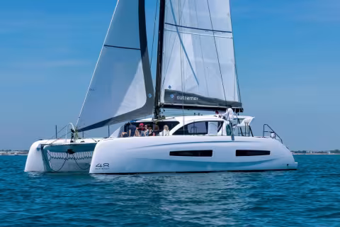 The design of the bows and side ribs visually streamline the freeboard without sacrificing interior volume.
