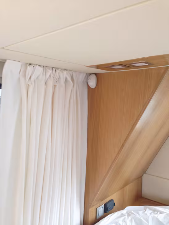 The motion sensor works by infrared, but be careful not to hide it. In general, avoid exposure to sunlight and draughty areas. 