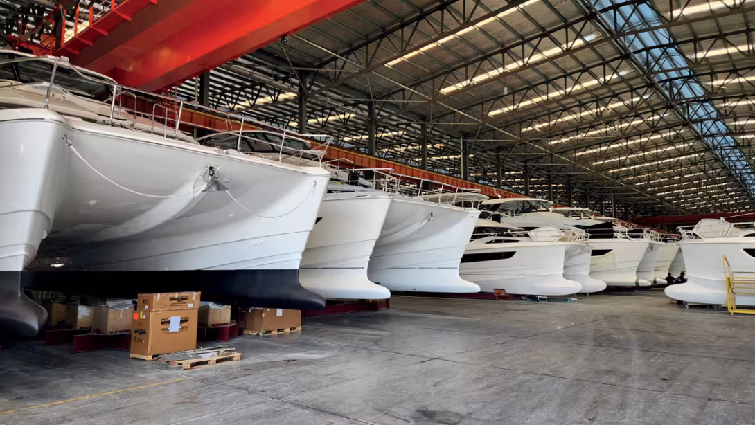 There were 50 boats in various stages of construction on the floor when we toured the 950-foot (288 m) long assembly factory.